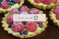 Baskets with custard and berries...