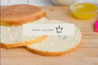 Collect the cake. Cut the completely cooled biscui...