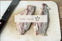 Gut the fish carcass, peel, rinse. Cut off the hea...