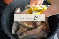 Transfer the fried ribs to a cauldron or a saucepa...