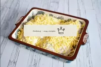 Sprinkle grated cheese over the top of the dish. B...
