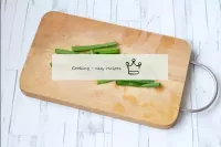 Wash the spring onions and cut into 3-4 parts so t...