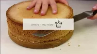CAKE: Turn the biscuit upside down and cut off the...