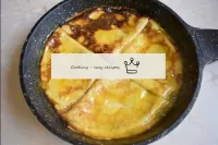 Fold the pancakes in triangles and place in hot sy...