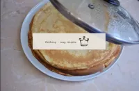Fold the ready-made pancakes onto a large plate an...