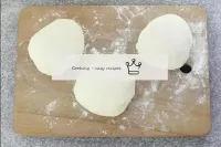 Move the rested dough to a sprayed board and wash ...