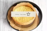 Top the cake with the remaining crumbs. Bake the c...