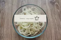 Fold the cut meat into a bowl and add the onion, c...