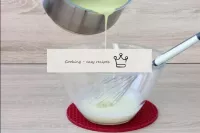 Beat the yolks with the sugar with a whisk until t...