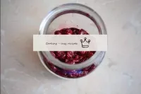Put the prepared berries in a clean jar. ...