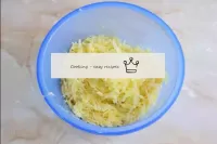 Rub the peeled potatoes on a coarse grater. If jui...