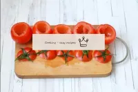 Wash the tomatoes, dry. Cut off the tops and caref...