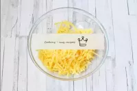 Grate the cheese over a coarse grater as well. Che...