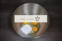 We drive eggs into a separate container, pour in i...