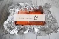 Cut the fish into portions and place in a foil-lin...