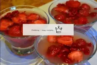 Pour the berries with the orange-gelatin mixture. ...