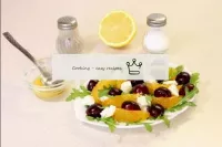 Cook the dressing, mixing orange and lemon juice i...