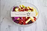 In a salad bowl, combine Beijing cabbage, apple, p...