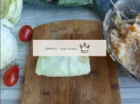 Wrap the edges of the cabbage leaf inside and fold...