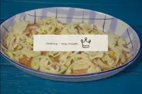 Put chopped half rings of onions on top...