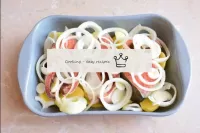 Peel the onion, rinse in cold water and cut into r...