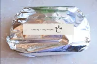 Cover everything with a sheet of foil on top and t...