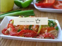 Pink salmon with tomatoes and onions in foil in th...