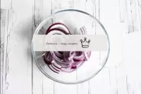 Peel a small red onion and cut into thin rings or ...