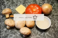 How to make champignons with cheese and tomatoes i...