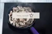 In a deep frying pan, heat the vegetable oil. Stir...