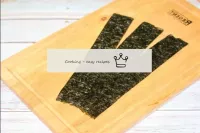 Cut the nori into strips. The width of one strip i...