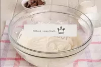 Using a mixer or whisk, whisk the ricotta until fl...