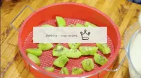 Cut two peeled kiwis into large pieces and put the...