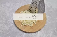 Grate the cheese over a coarse grater. It is bette...