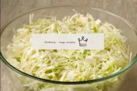 Wash the cabbage and remove the top coarse and dir...