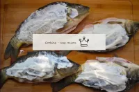 Rub each fish with marinade on all sides and insid...