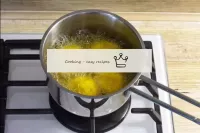 In a saucepan, heat vegetable oil over a medium he...