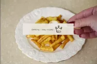 At the very end, salt the fries. You can also spri...
