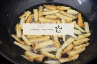 Cook the fries until golden and the potatoes are r...