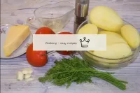 How to bake potatoes with cheese and tomatoes in t...