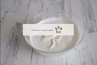 Beat the cooled cream into a strong stable foam, g...