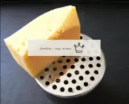 Grate the chilled cheese. ...