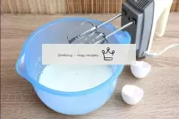 Beat the eggs with salt and sugar at medium rpm un...