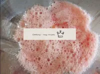 Whisk the cocktail again in a blender. Pink foam w...