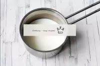 Heat the milk in a saucepan over a low heat, but d...