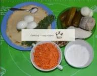 The foods needed to make Koyash salad. Pancakes ar...