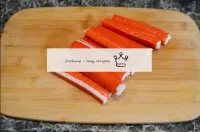 Clean the crab sticks. If you have frozen crab sti...