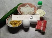 How to make a salad with rice, crab sticks, cucumb...