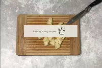 We cut the pineapple into small pieces. We leave s...