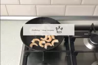 Pour oil into the pan, lay out the shrimp. Fry for...